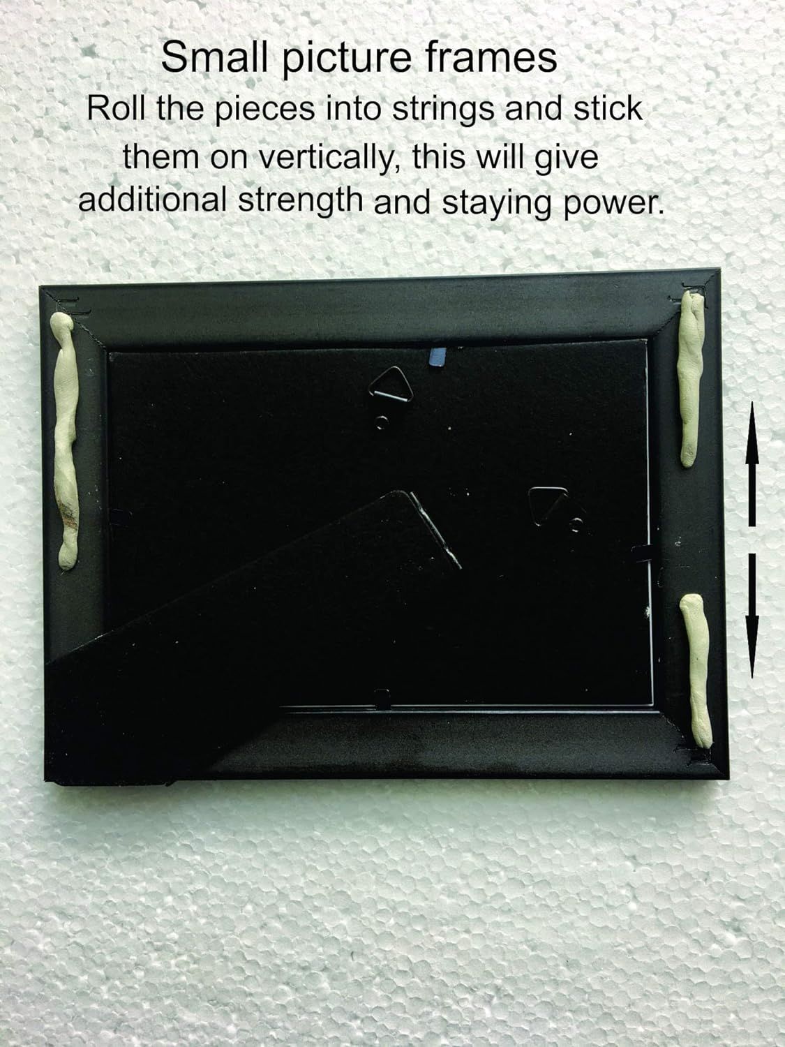 Demonstrates a specific installation method for small picture frames, instructing users to roll adhesive into strings and apply vertically for stronger mounting and staying power.