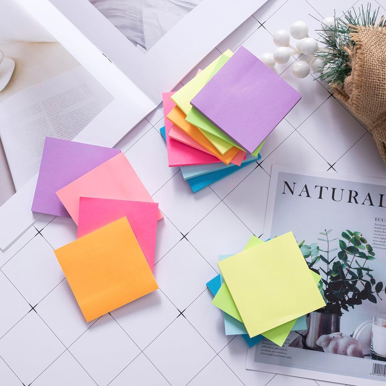Displays the product in a clean, catalog-style format to show the variety of vibrant colors available in the sticky note set.