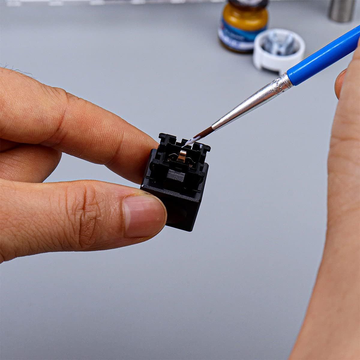 Demonstrates how to use the product (likely a soldering tool or precision screwdriver) to perform detailed repair or assembly work on small electronic components. Shows the product's ability to…