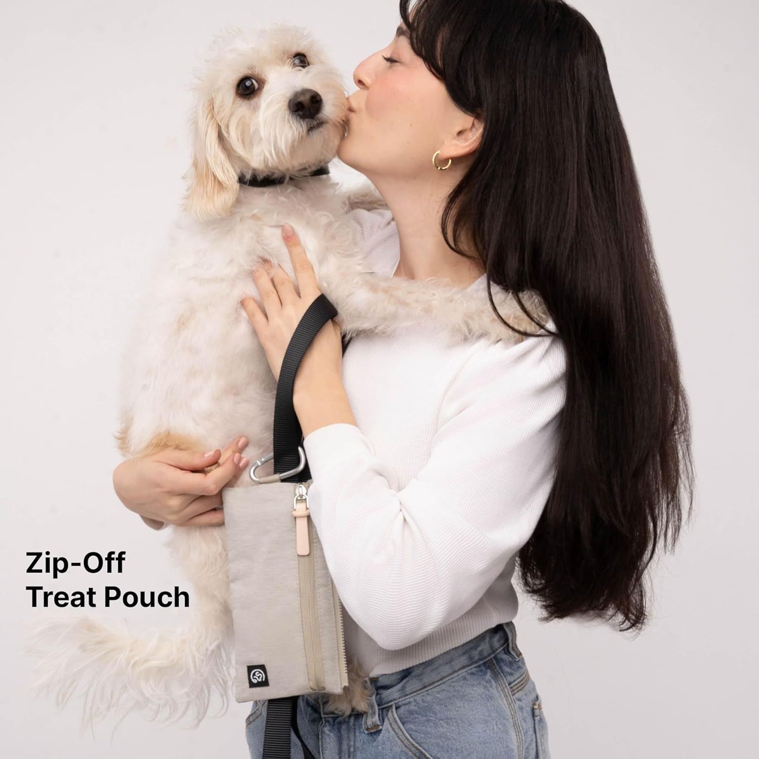 Highlights the removable treat pouch feature with a simple lifestyle photo and clear text callout, showing convenience for pet owners.