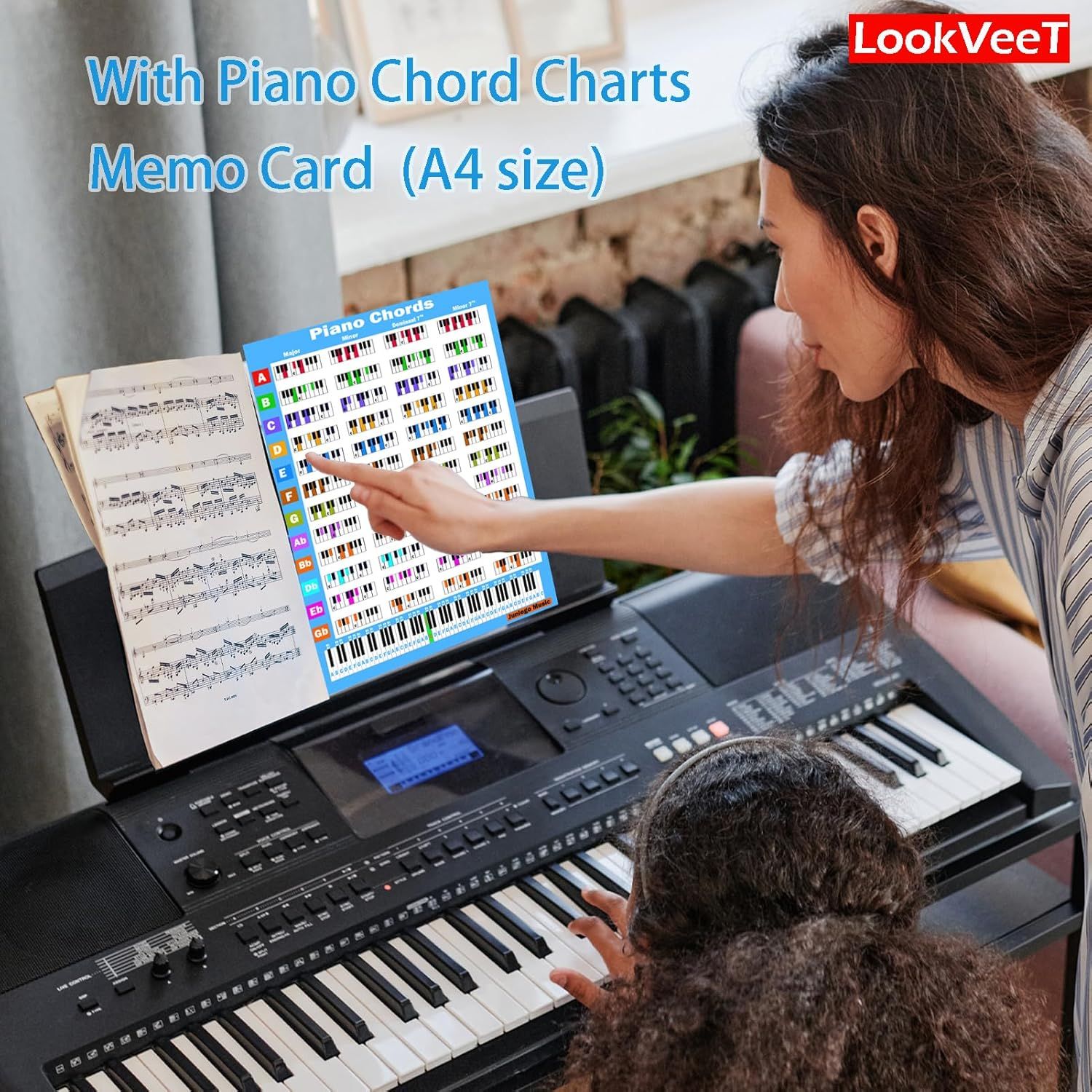 Shows the product being used in a real learning scenario with a piano to help shoppers visualize how the chart fits into their music practice routine.