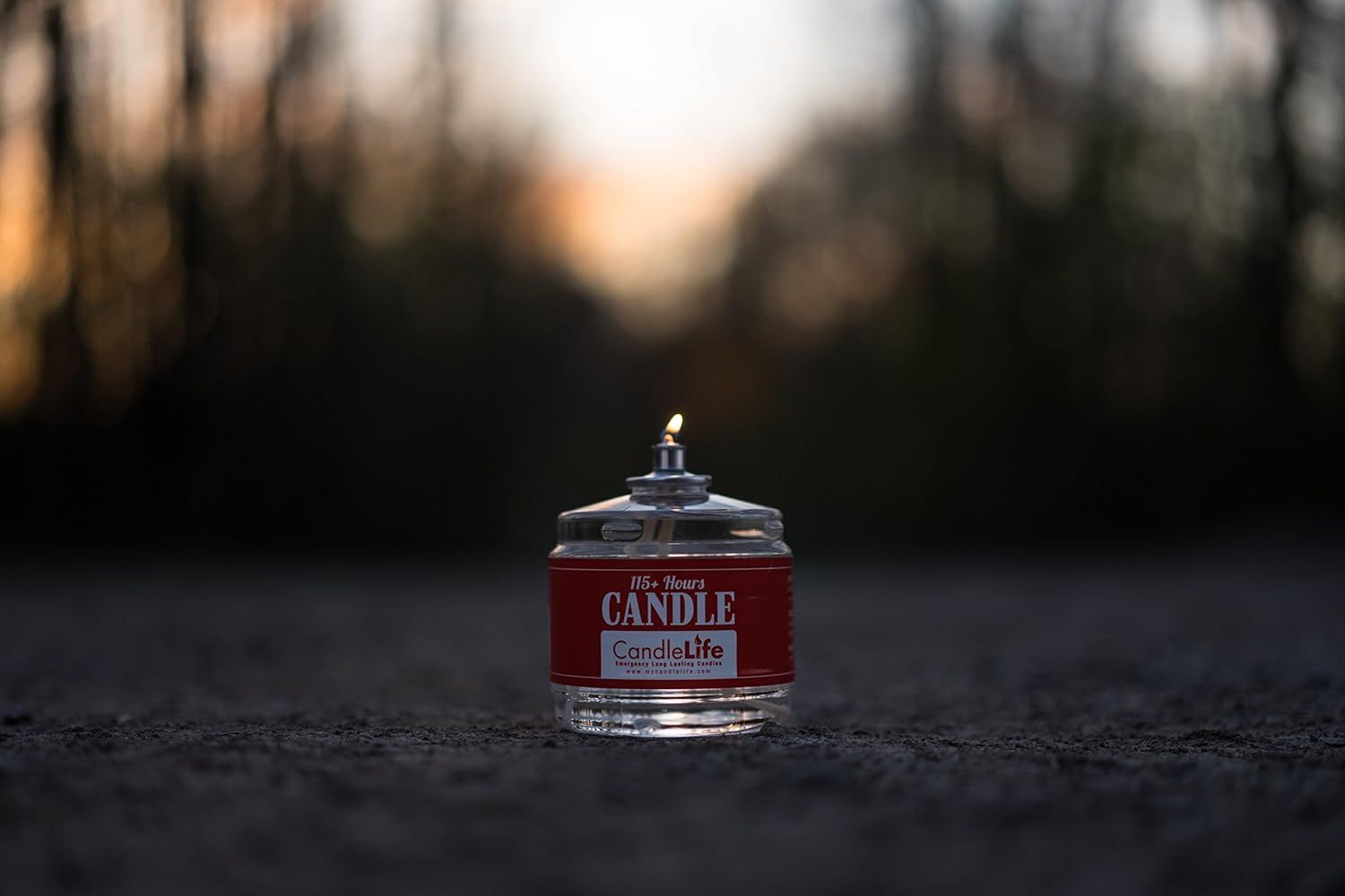 Shows the candle in a real-world outdoor setting to help shoppers visualize using the product in their own environment.