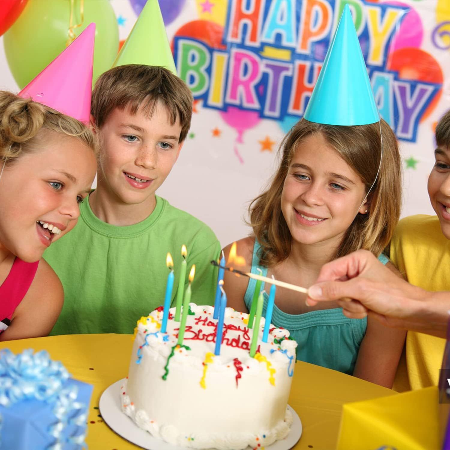 Shows the product in use at a real birthday party setting to help shoppers visualize the cake base in a celebratory context.