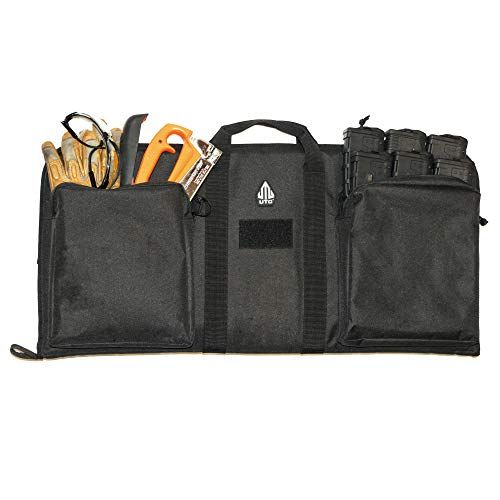 Shows the interior layout and organizational compartments of the tool bag, demonstrating how tools and accessories can be stored in multiple pockets.