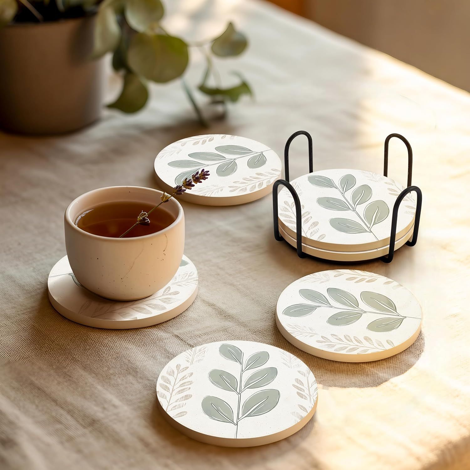 Shows everything included in the purchase: coasters, metal holder, and the complete set layout to help shoppers understand the full package they will receive.
