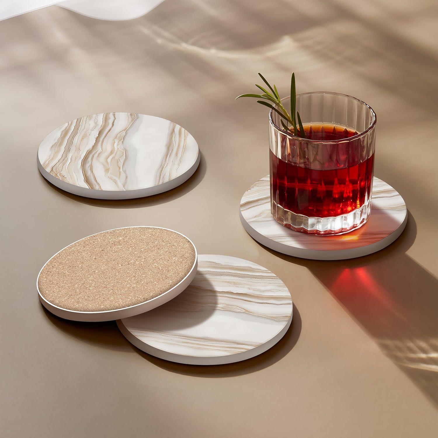 Shows the coasters in use with a cocktail in an elegant setting, demonstrating versatility and aesthetic appeal for entertaining.