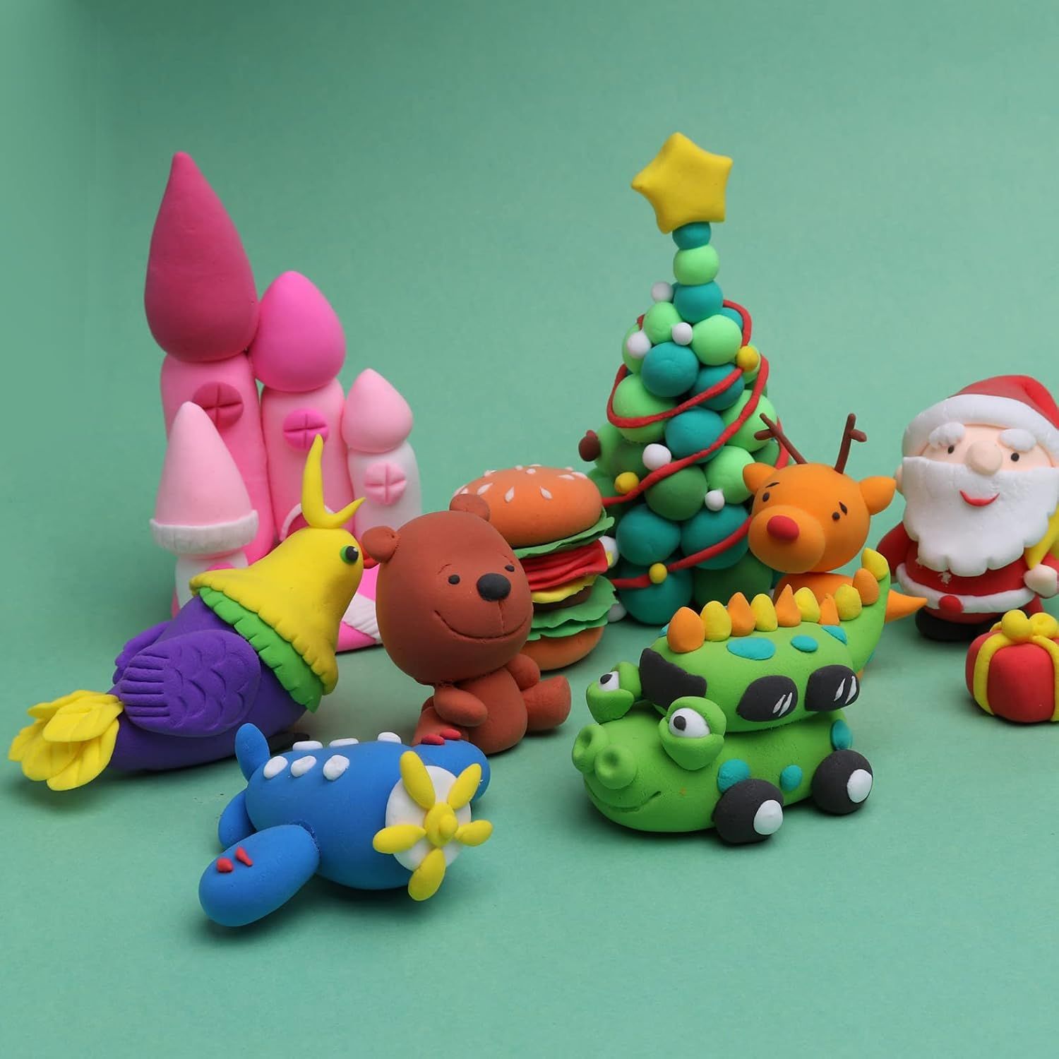 Showcases various holiday-themed creations including Santa, Christmas tree, and reindeer to position the modeling clay as a perfect seasonal activity or gift for the holidays.