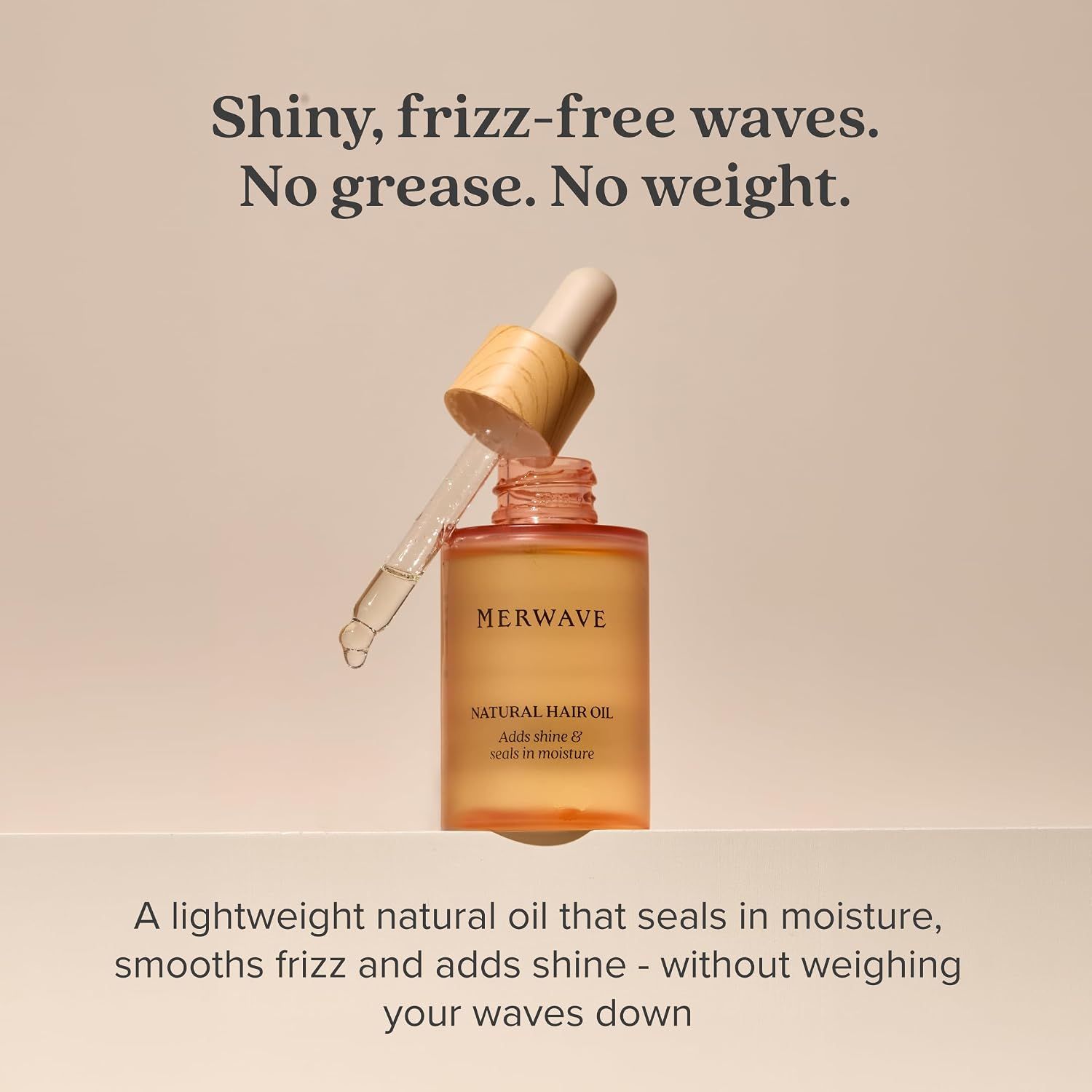 Communicates that the hair oil delivers shiny, frizz-free waves without greasiness or weighing hair down, reassuring shoppers of a lightweight formula.