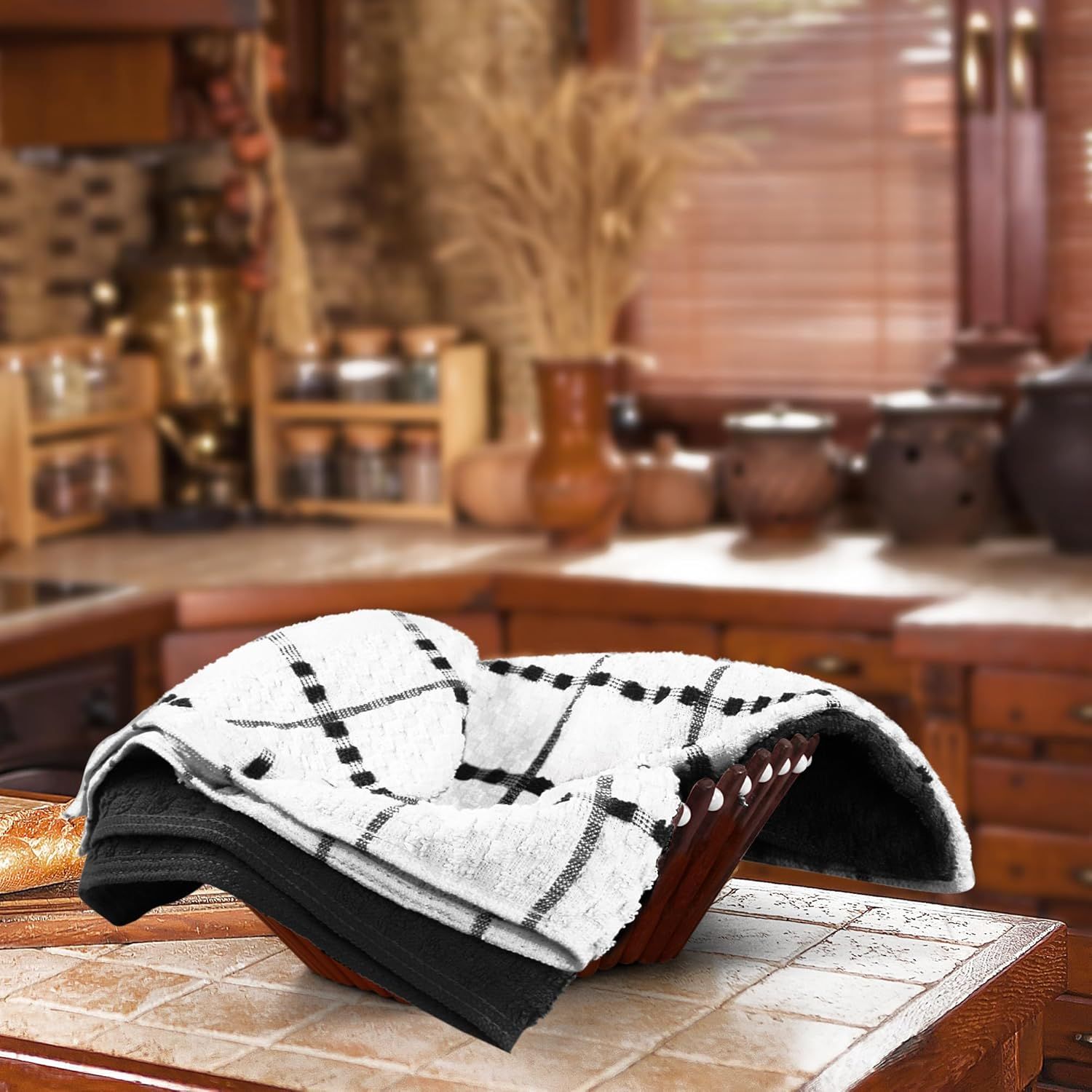 Presents the towels in a warm, rustic kitchen setting to help shoppers visualize how the product fits into their home decor.
