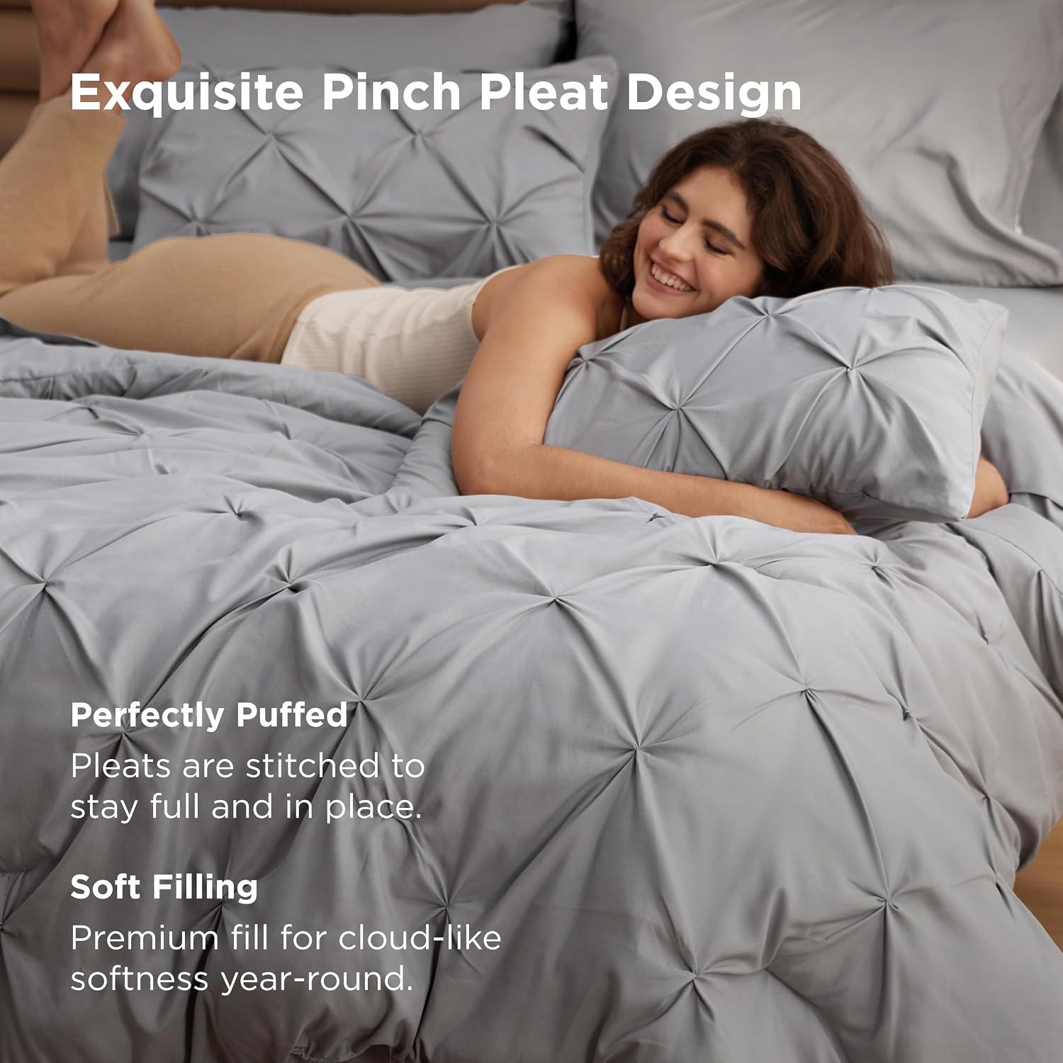 Highlights multiple benefits of the comforter including its decorative pinch pleat design, construction quality that keeps pleats in place, and premium soft filling for year-round comfort.