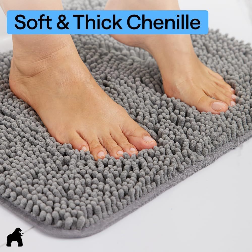 Demonstrates the plush, comfortable chenille texture of the bath rug to communicate softness and luxury underfoot.