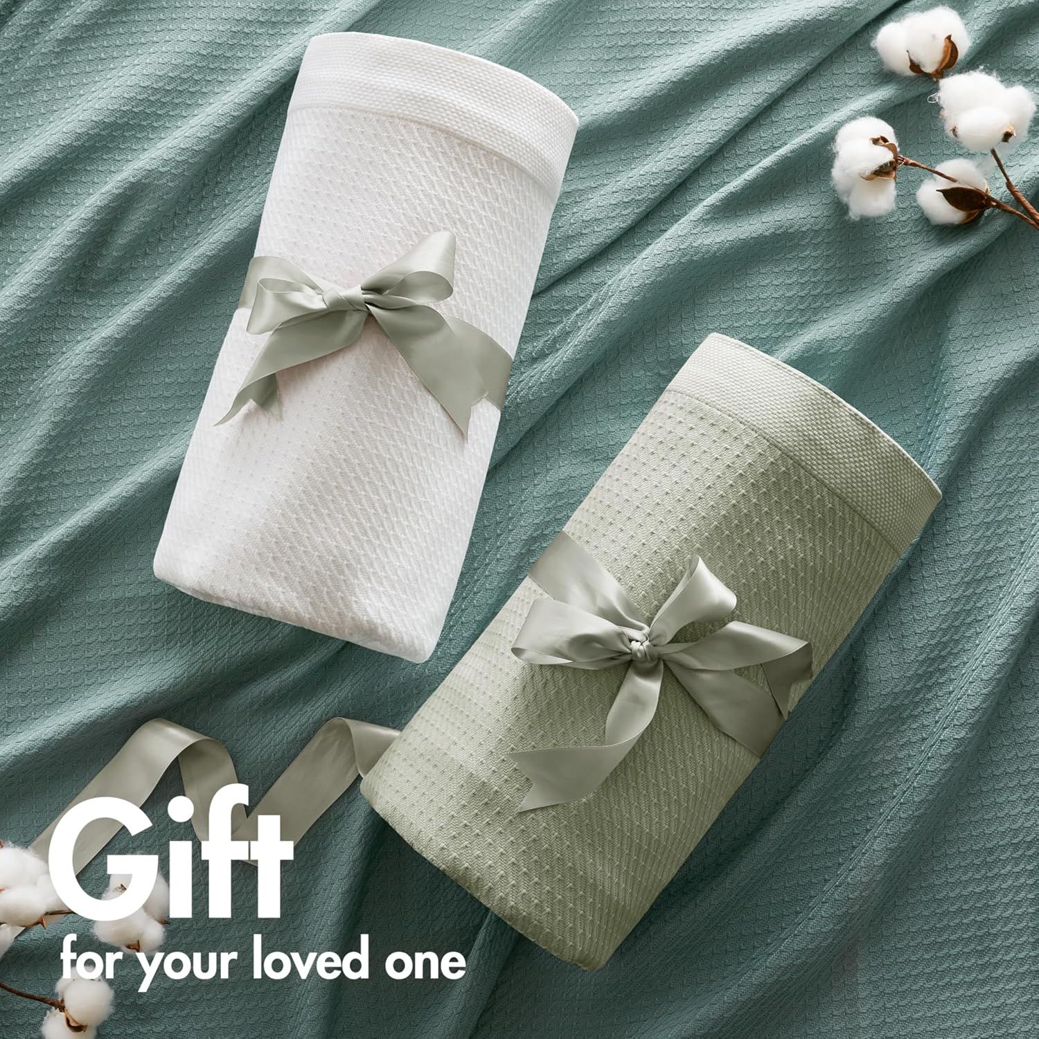 Positions the product as a gift option by showing it wrapped with decorative ribbons and cotton accents.