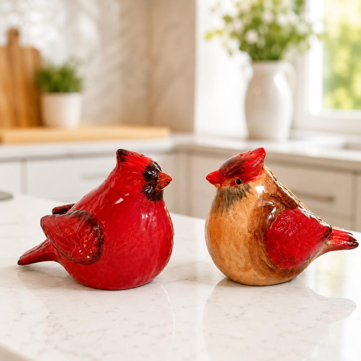 Shows the cardinal salt and pepper shakers in a real kitchen setting to help shoppers visualize how the product looks in their home.
