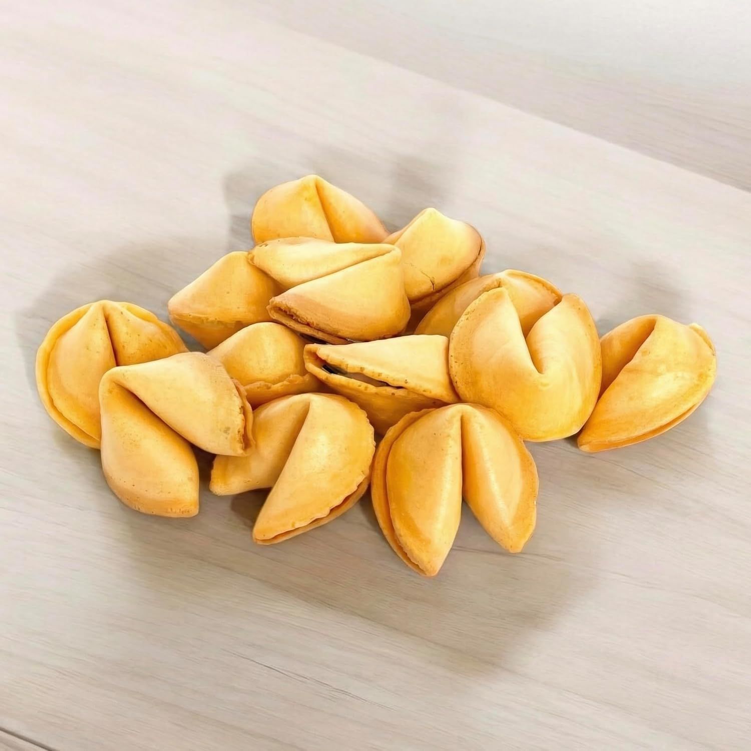 Presents the fortune cookies in a clean, simple arrangement to help shoppers see the product's appearance and quantity in a real-world context.