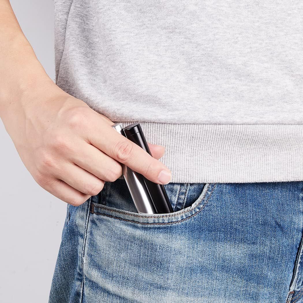 Shows the product in a real-world context being placed in a pocket, demonstrating portability and everyday convenience.