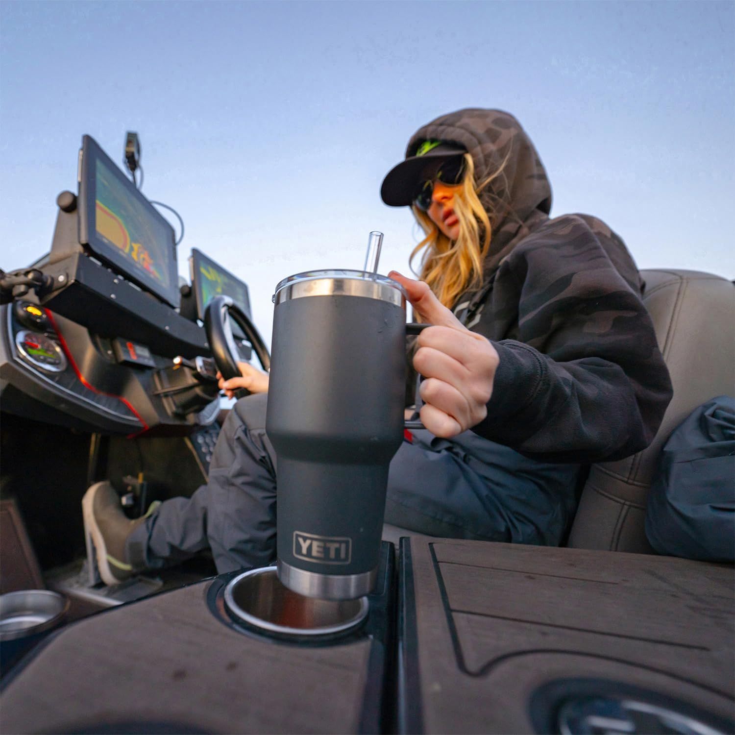Demonstrates the product in use during an outdoor boating activity to help shoppers visualize using it in real-world adventure scenarios.