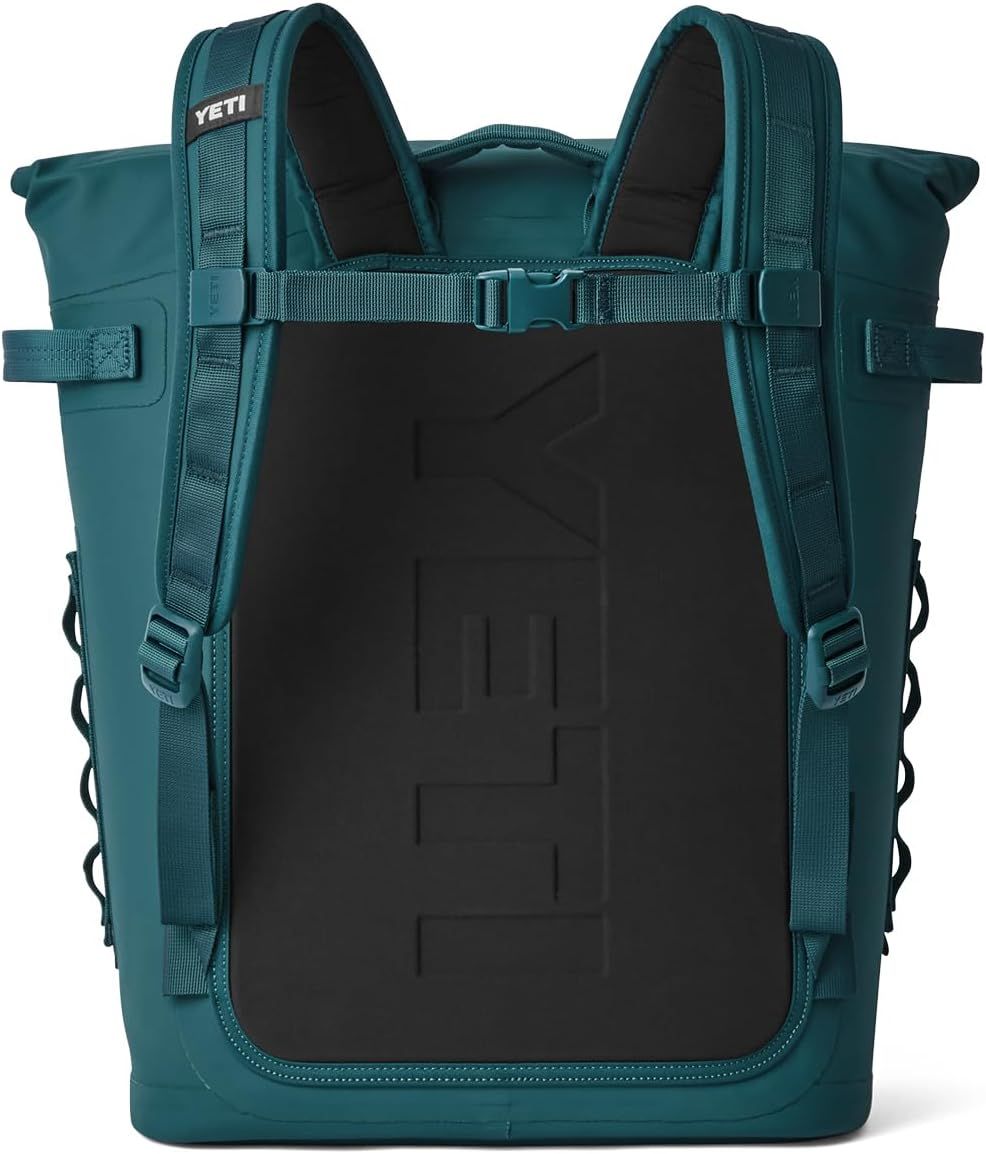 Shows the back panel and strap system of the backpack in a clean white background product shot.