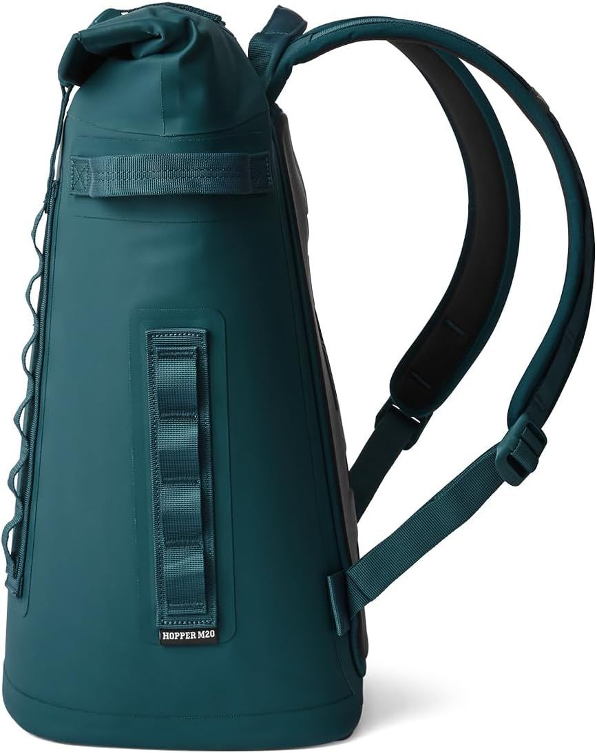 Displays the side profile of the backpack on a clean white background to show its shape and strap configuration.