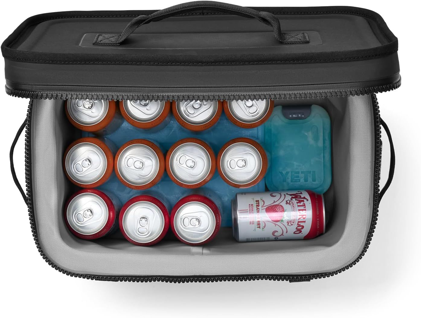 Shows the cooler's interior loaded with cans and ice packs to demonstrate its capacity and organizational layout in one clean visual scene.