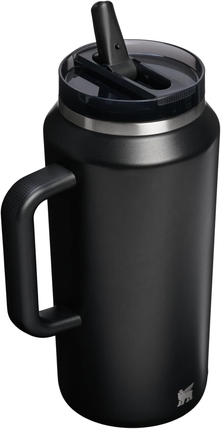 Clean white background product shot showing the tumbler with its flip straw lid in the closed position.
