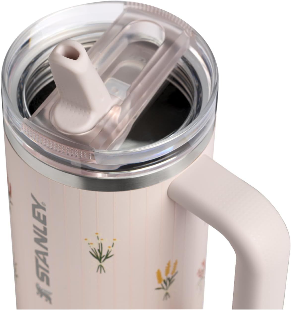 Shows the product in a real-world context with a close-up view of the flip straw lid mechanism, allowing shoppers to visualize the product design and functionality.