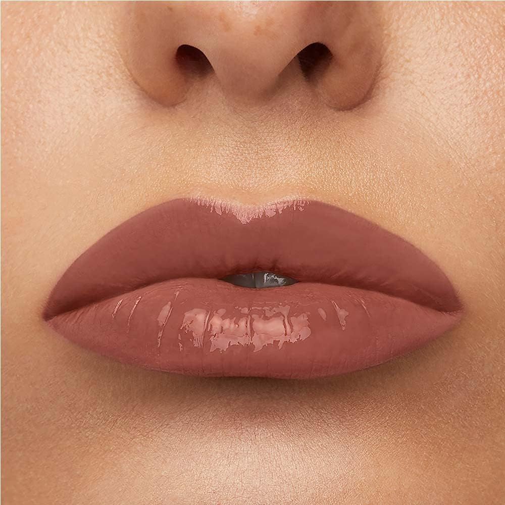 Shows the finished glossy lip look in close-up so shoppers can judge shade and shine.