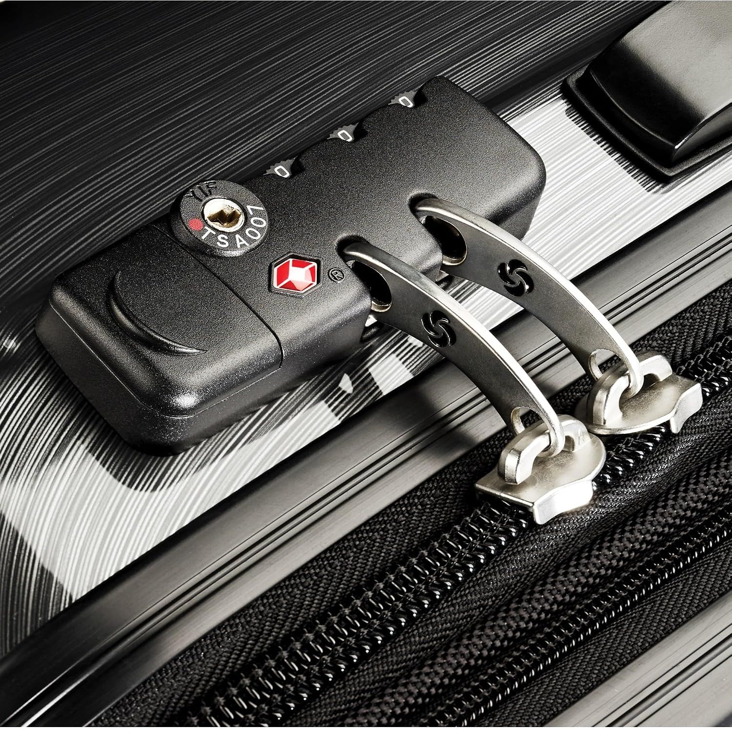 Close-up of the built-in TSA-approved combination lock reassures shoppers that their belongings stay secure while traveling.