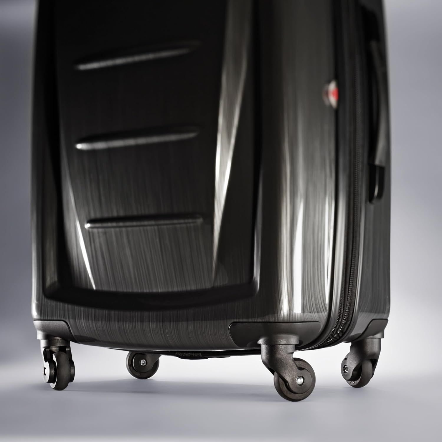 Close-up of the four spinner wheels shows the case can roll smoothly in any direction with less effort.