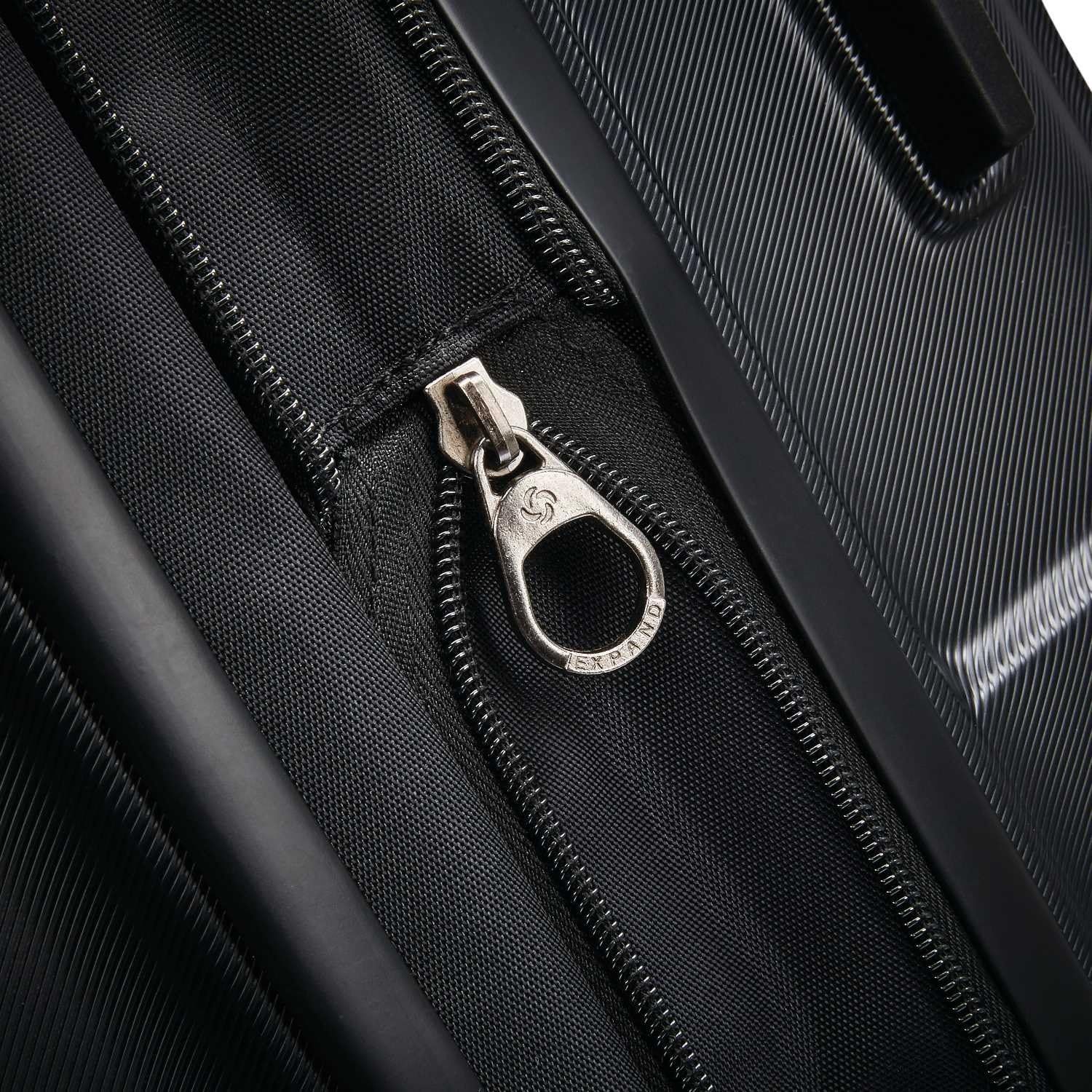 Close-up of the expansion zipper shows the case adds packing room when needed.