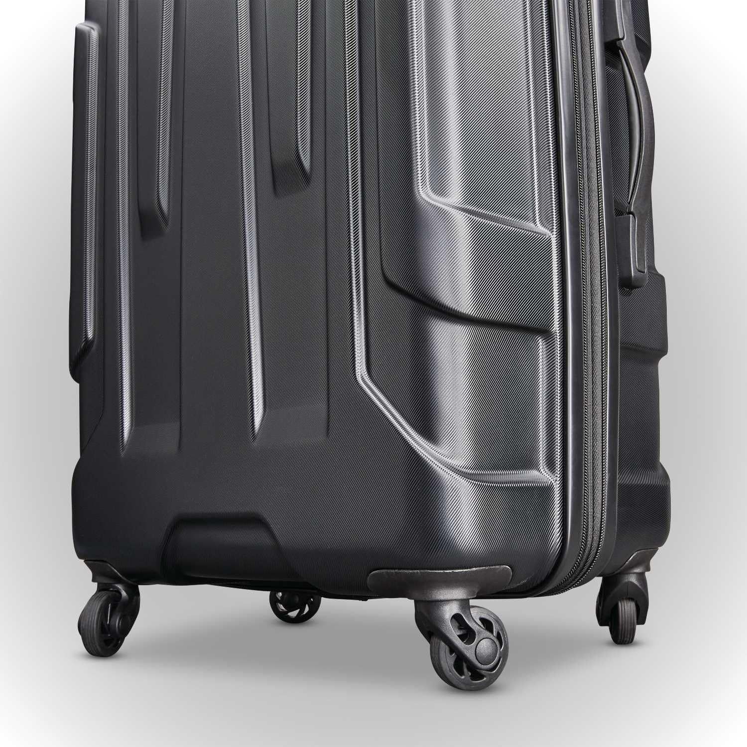Close-up of the four spinner wheels shows smooth 360-degree movement through airports.