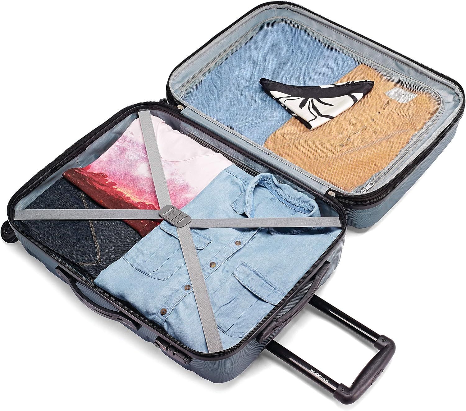 Shows clothes held in place by the packing straps, reassuring shoppers the interior keeps packing organised.
