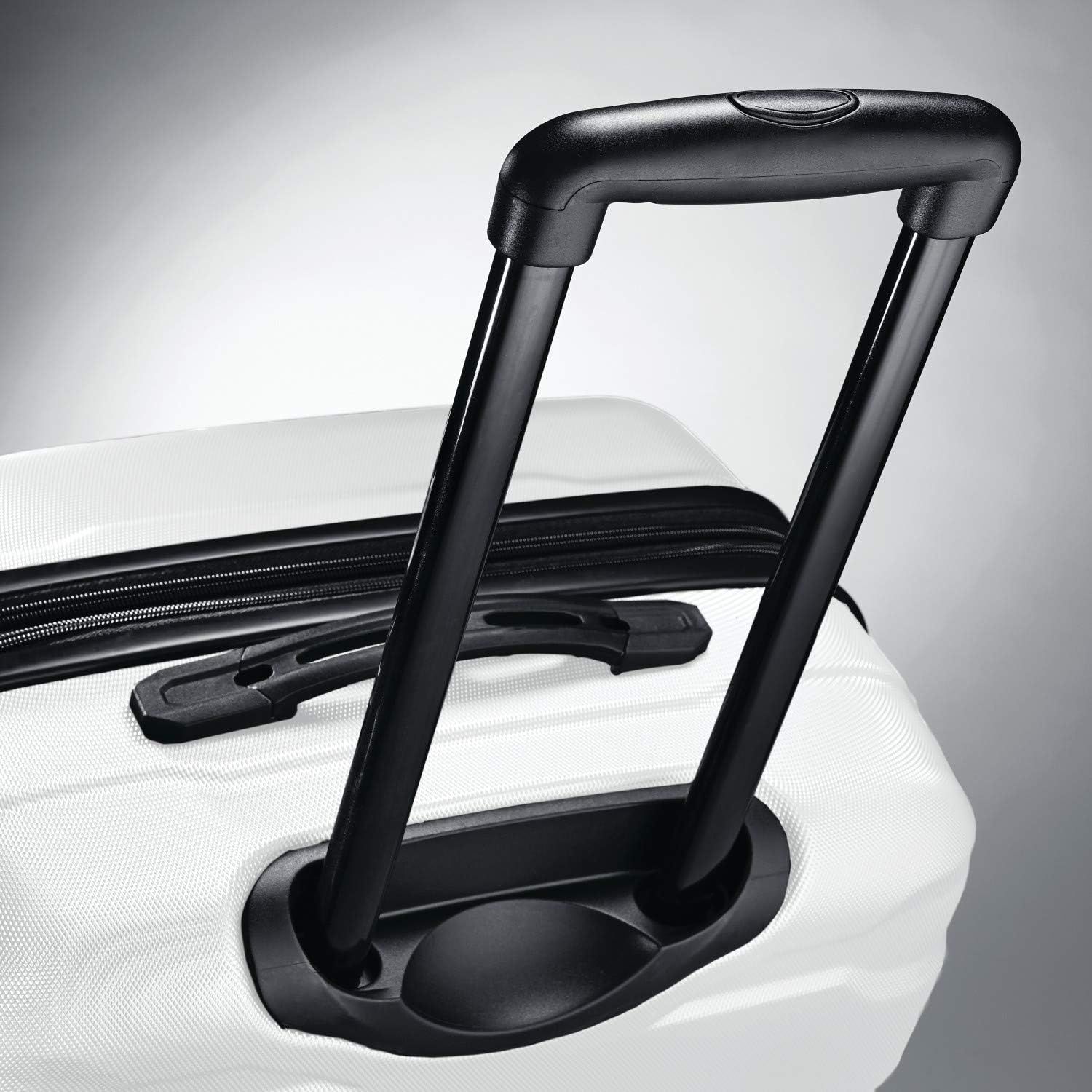 Close-up of the extended trolley handle shows the smooth, sturdy pull handle for easy rolling.