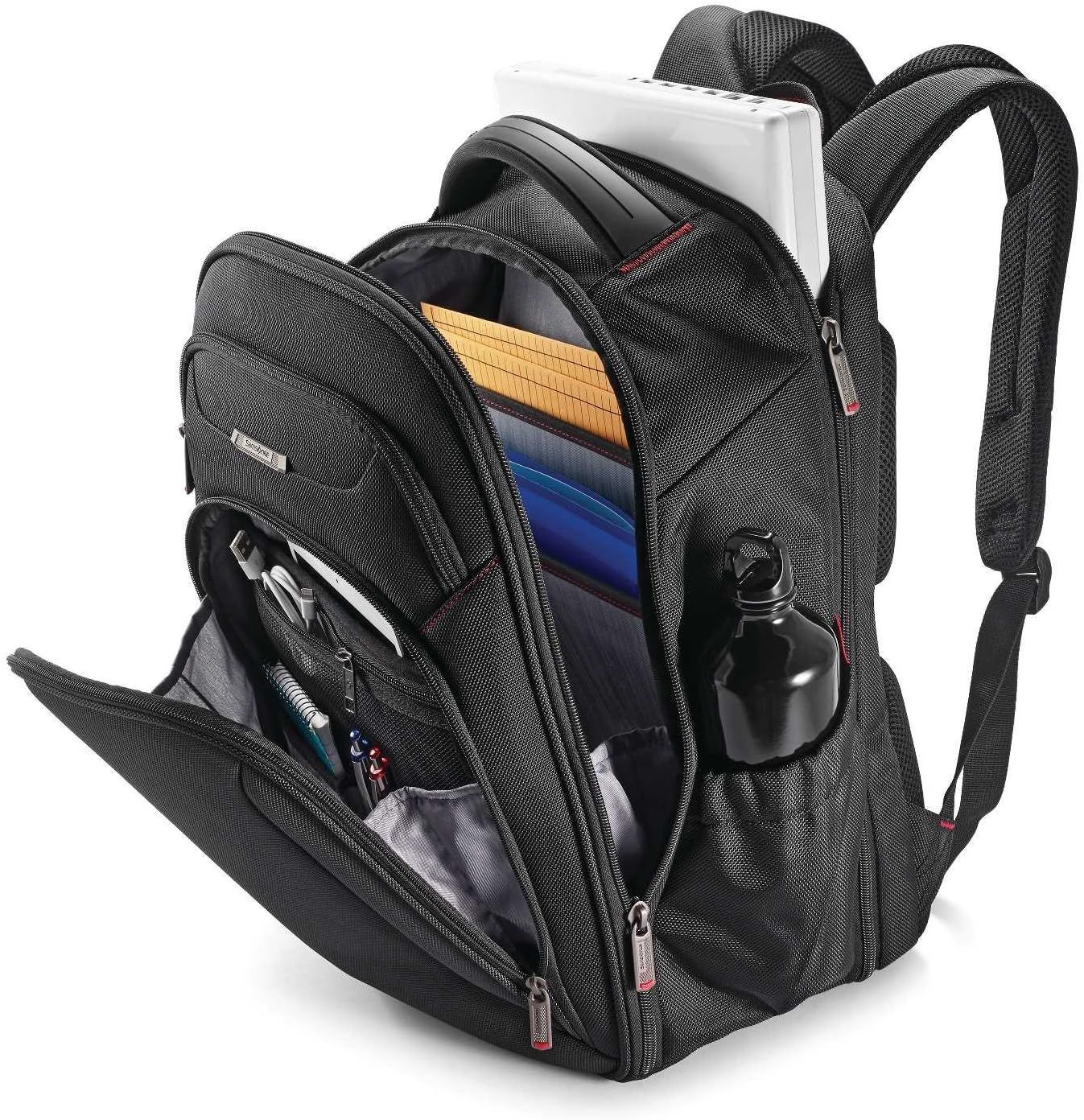 Open bag with laptop, folders and bottle shows the roomy, organized interior in everyday use.