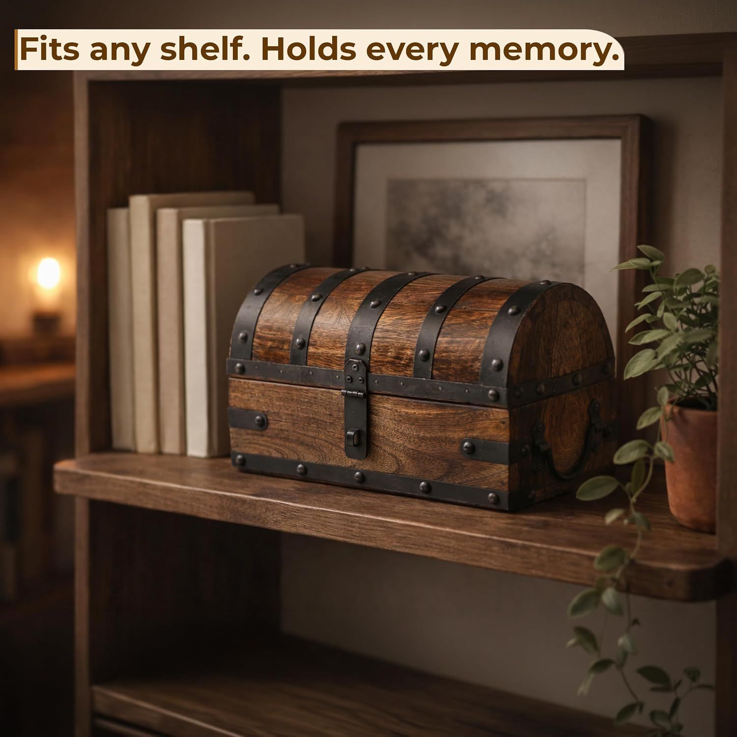Shows the chest fits neatly on a bookshelf to reassure shoppers about display space. Styled shelf setting showing the chest in a home environment.