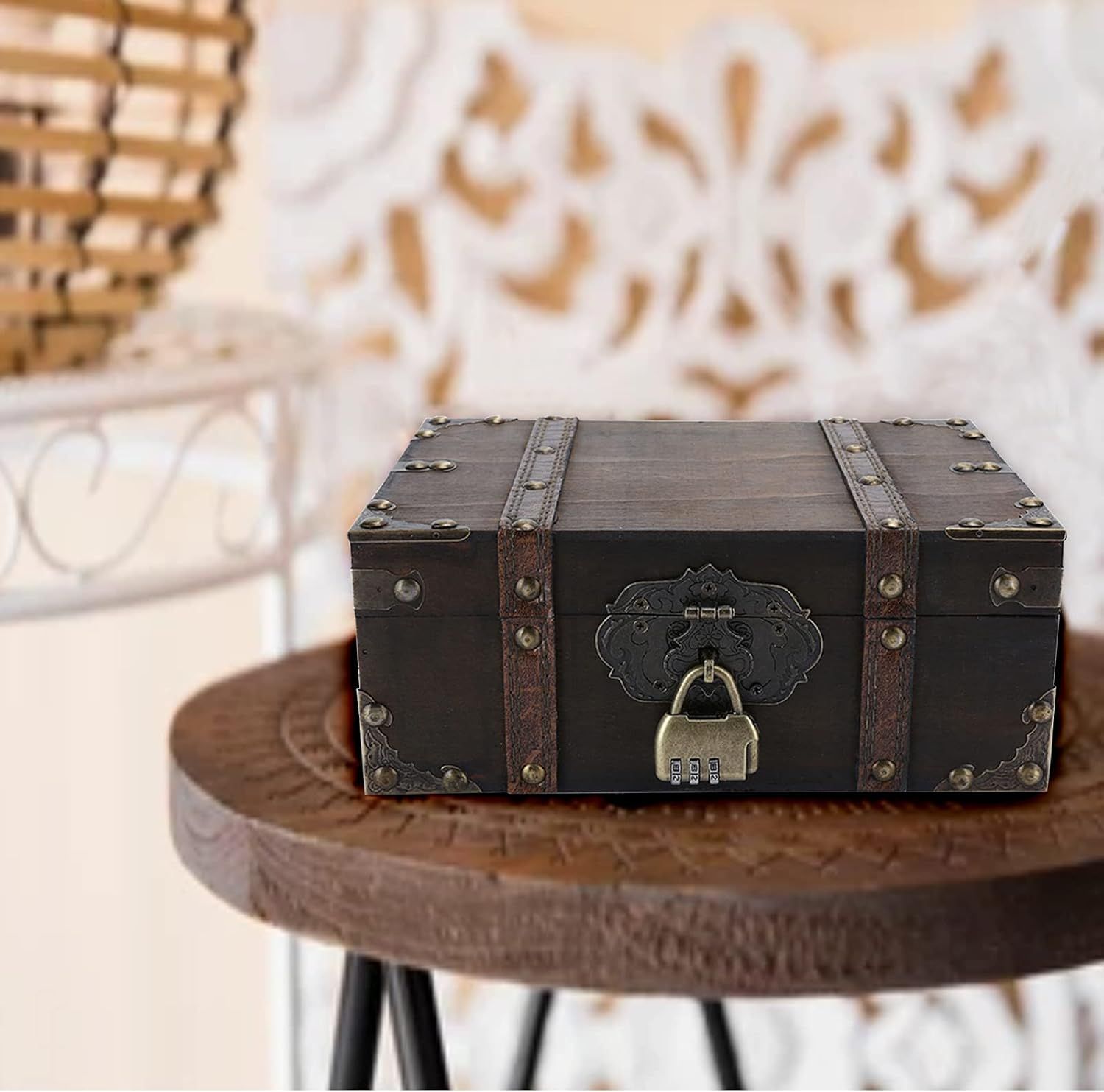 Shows the box styled on a wooden stool in a home setting to suggest decorative use.