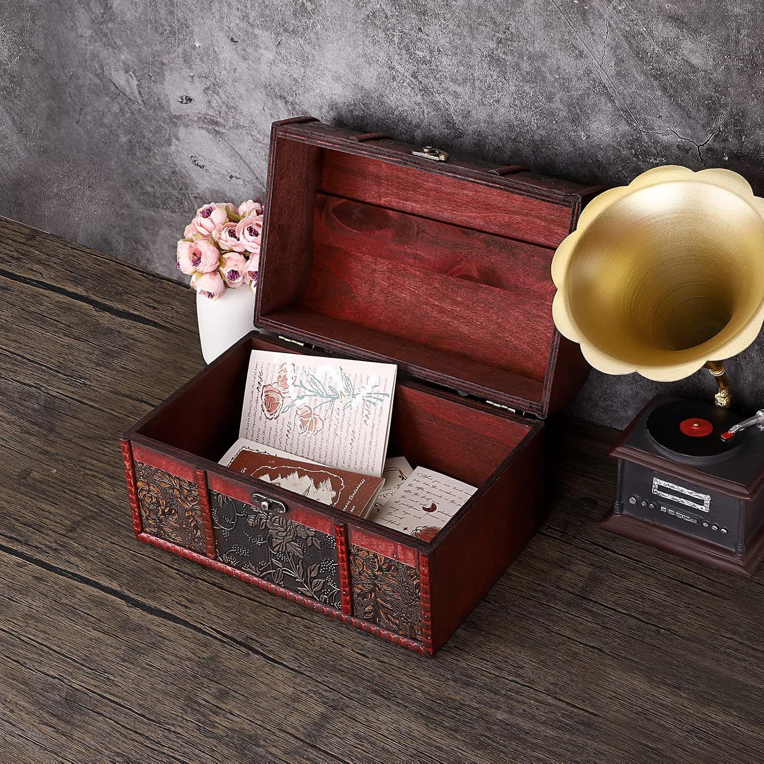 Shows the chest open with room to store keepsakes while adding vintage decor appeal.