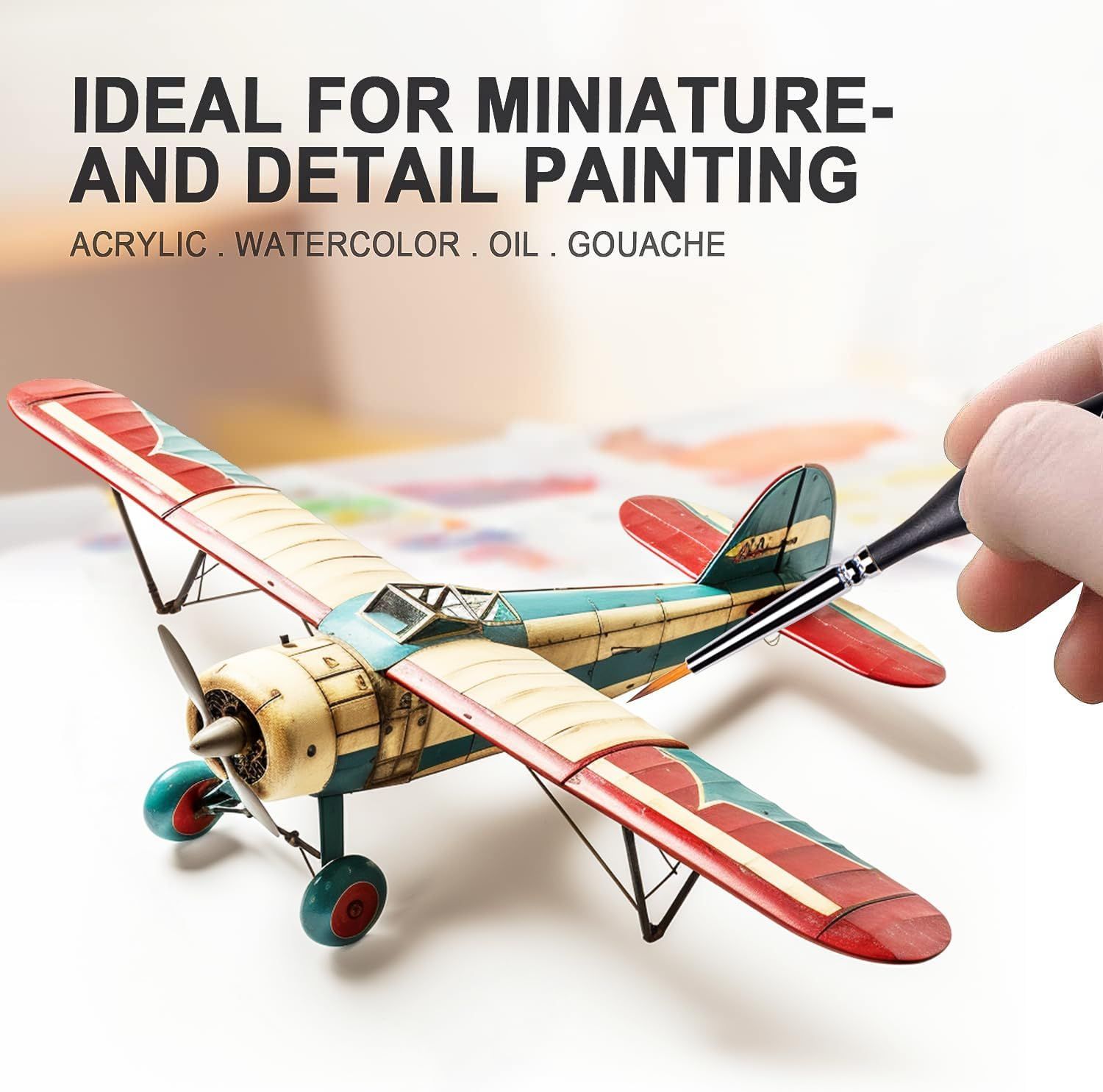 Shows the brush being used on a miniature model to communicate that it is ideal for detailed painting work. Lists acrylic, watercolor, oil, and gouache to show the brush works across several paint…