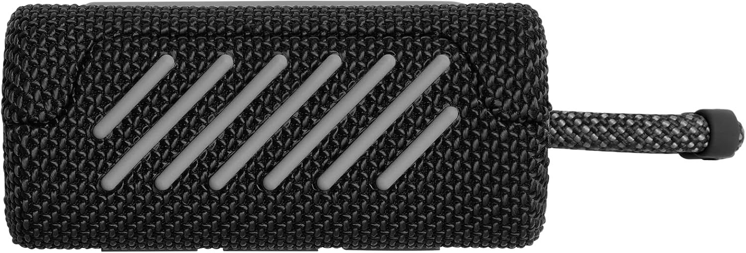 Shows the speaker side grille and rugged woven exterior. Highlights the physical build of the device.