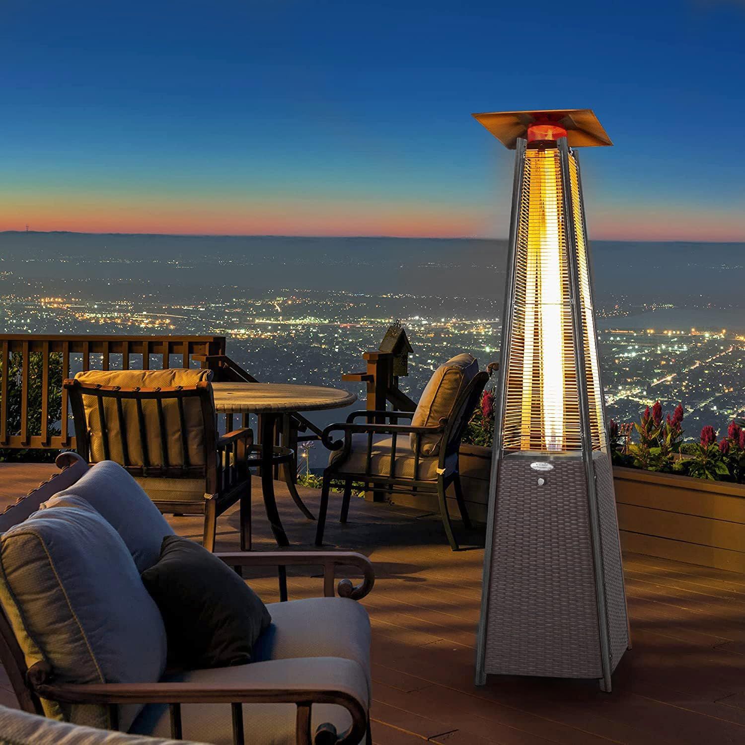 Shows the heater extending comfortable outdoor seating into the evening on a scenic deck.