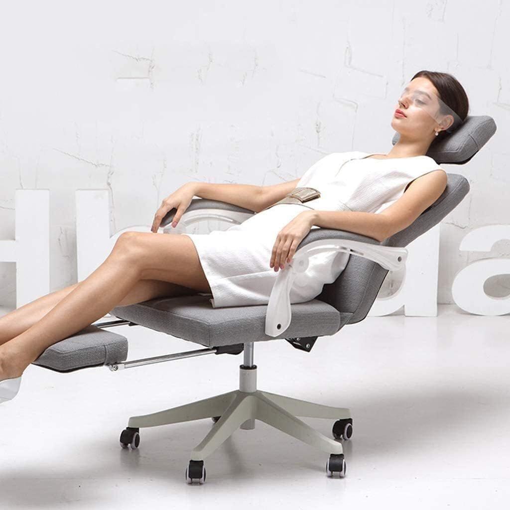 Shows the chair reclined with footrest extended to convey relaxed, full-body comfort.