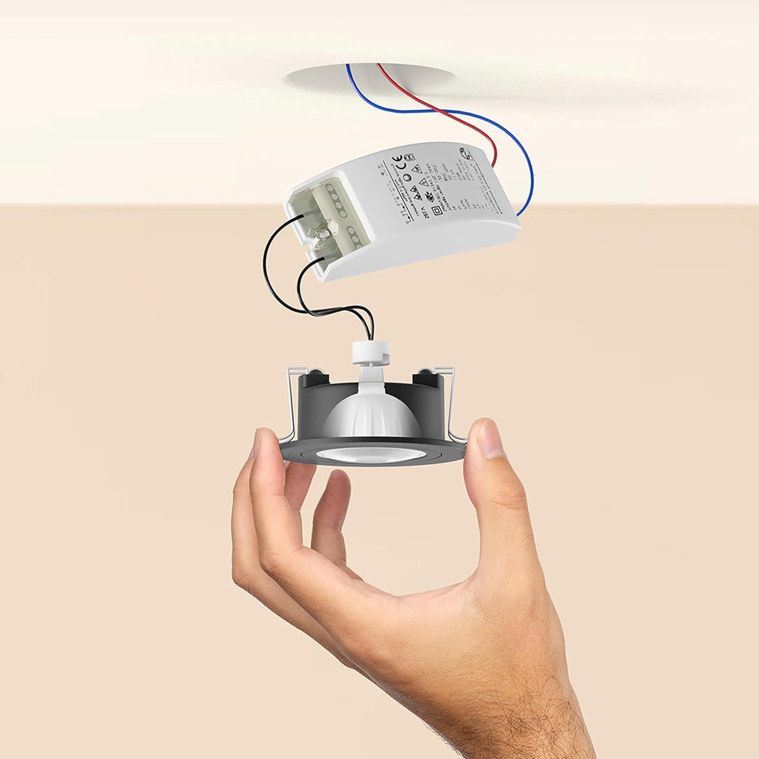 Illustrates how the driver and fitting connect for simple installation in existing recessed ceiling setups.