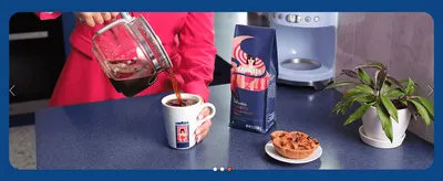 Shows the product being brewed and enjoyed in a real kitchen setting to help shoppers envision ownership.