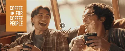 Introduces the brand personality with a warm, friendly coffee moment to build emotional connection. Shows people enjoying coffee together so shoppers picture the product in their own routine.