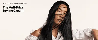 Positions the product as an anti-frizz styling cream with one bold headline over a striking hair photo.
