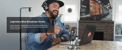 Shows the mic in real use by a content creator to reassure shoppers the microphone delivers professional, legendary Blue broadcast sound for podcasting and streaming.