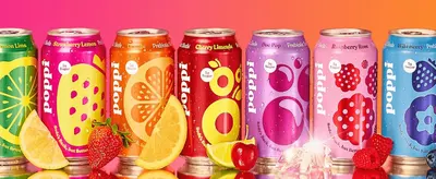 Displays the full flavor range side by side so shoppers see the variety and the brand's colourful identity.