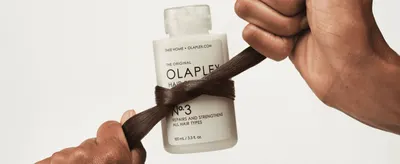 Visually conveys the product's hair-strengthening power through a real-world styling moment.