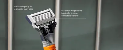 Points out the lubricating strip and 5-blade design to explain what makes the razor cartridge effective. Highlights two distinct benefits of the cartridge, a smooth glide and a close comfortable…