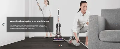 Shows the vacuum being used across multiple home surfaces to communicate all-round cleaning versatility.