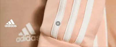 Close-up of the iconic three-stripe detail with a video play button to invite shoppers to watch more brand content.